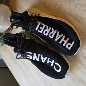 CHANEL X PHARRELL ADIDAS HUMAN RACE SNEAKERS